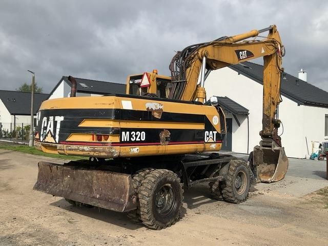 CAT M320 - حفار ذو عجلات: صورة 4 CAT M320 - حفار ذو عجلات: صورة 4