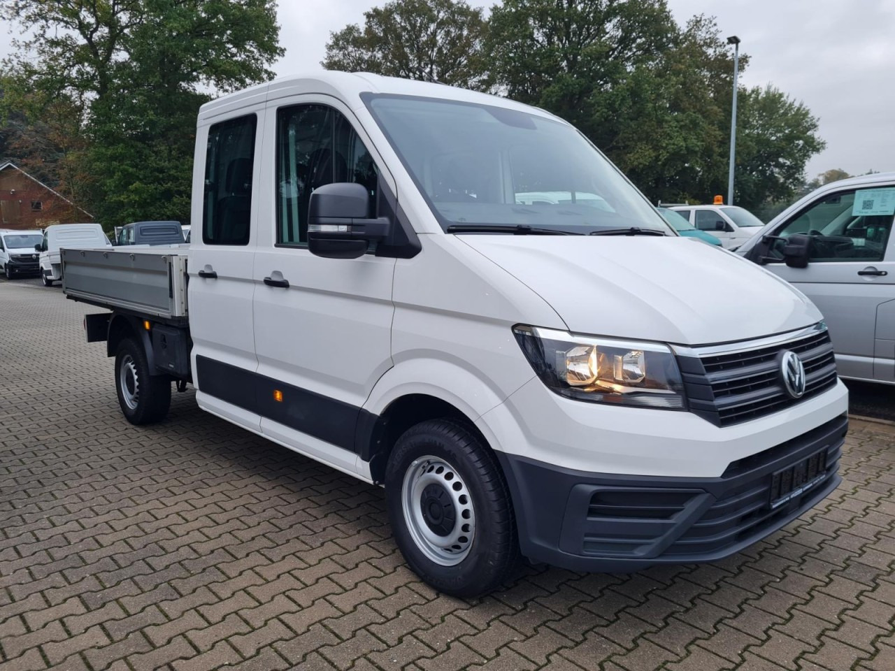 Volkswagen Crafter 35 Doka MR Pritsche AHK Klima 7 Sitzer - شاحنة توصيل مفتوحة, الشاحنات الصغيرة كابينة مزدوجة: صورة 3 Volkswagen Crafter 35 Doka MR Pritsche AHK Klima 7 Sitzer - شاحنة توصيل مفتوحة, الشاحنات الصغيرة كابينة مزدوجة: صورة 3