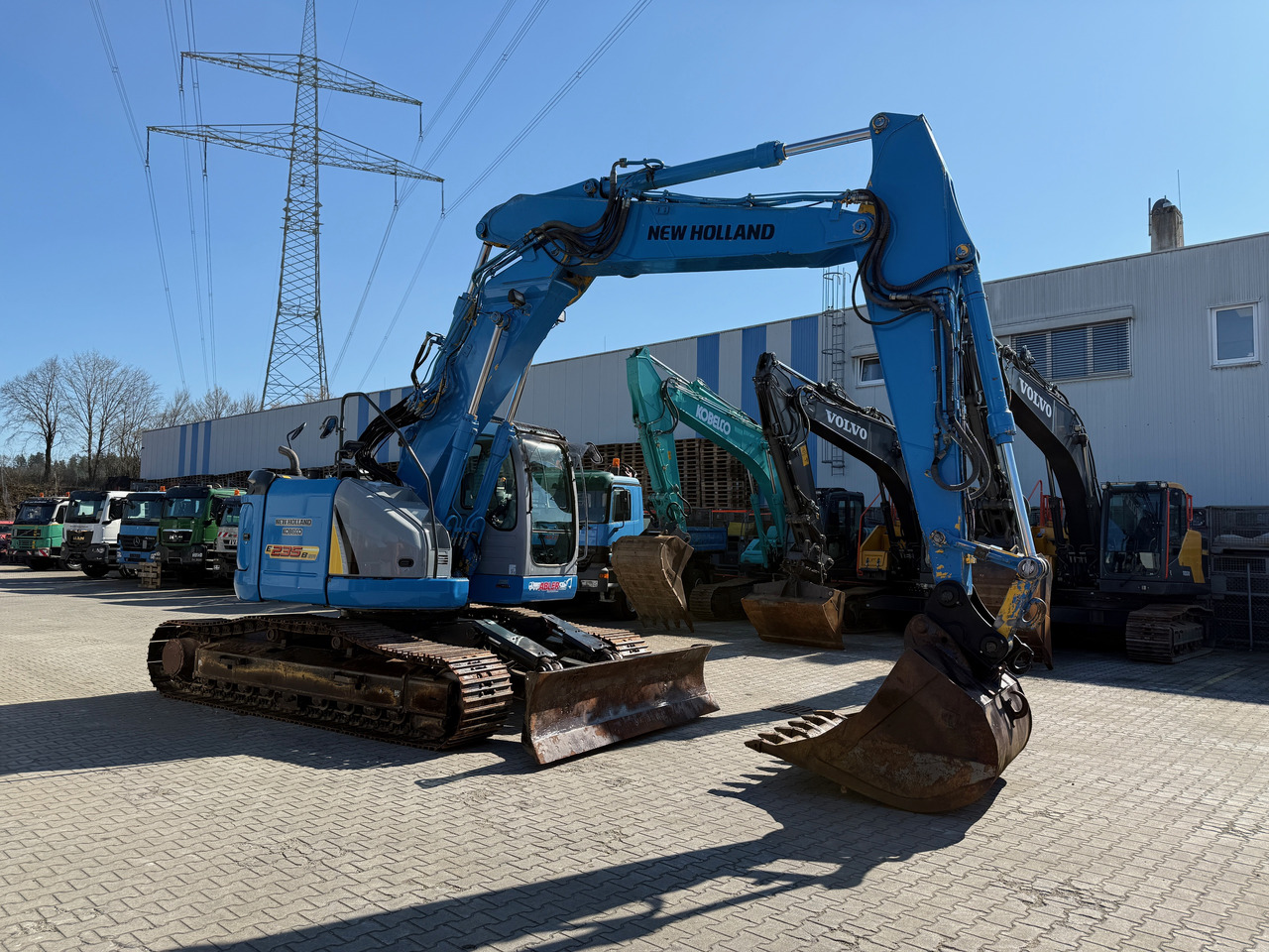 New Holland Kobeclo E235 BSR-2 Nullheck Kettenbagger MS21 - حفّار: صورة 3 New Holland Kobeclo E235 BSR-2 Nullheck Kettenbagger MS21 - حفّار: صورة 3
