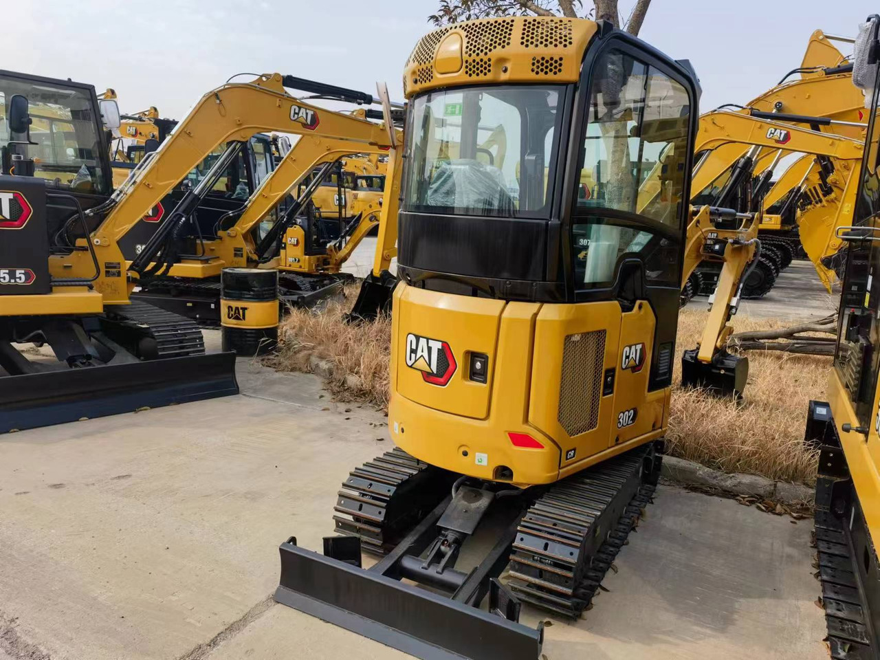 Caterpillar 302 - حفار زاحف: صورة 2 Caterpillar 302 - حفار زاحف: صورة 2