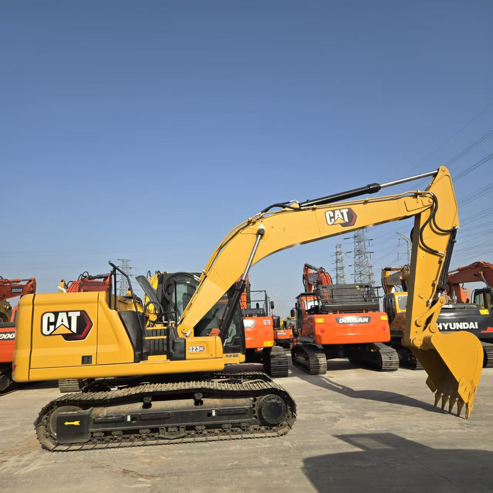 Caterpillar 323GC - حفار زاحف: صورة 1 Caterpillar 323GC - حفار زاحف: صورة 1