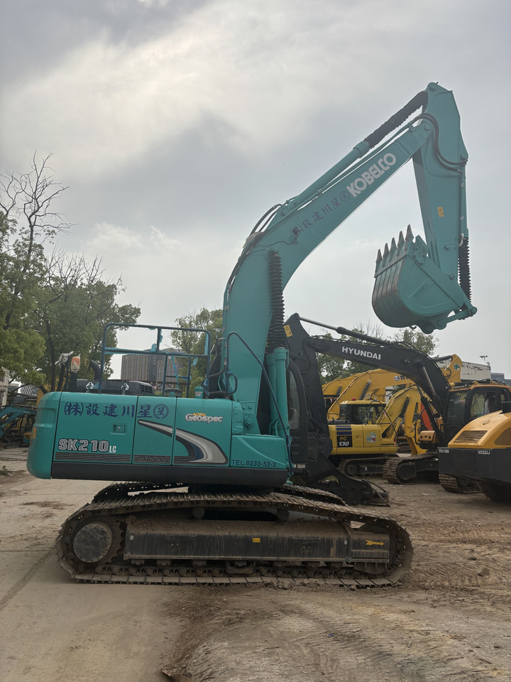 KOBELCO SK210LC - حفار زاحف: صورة 2 KOBELCO SK210LC - حفار زاحف: صورة 2