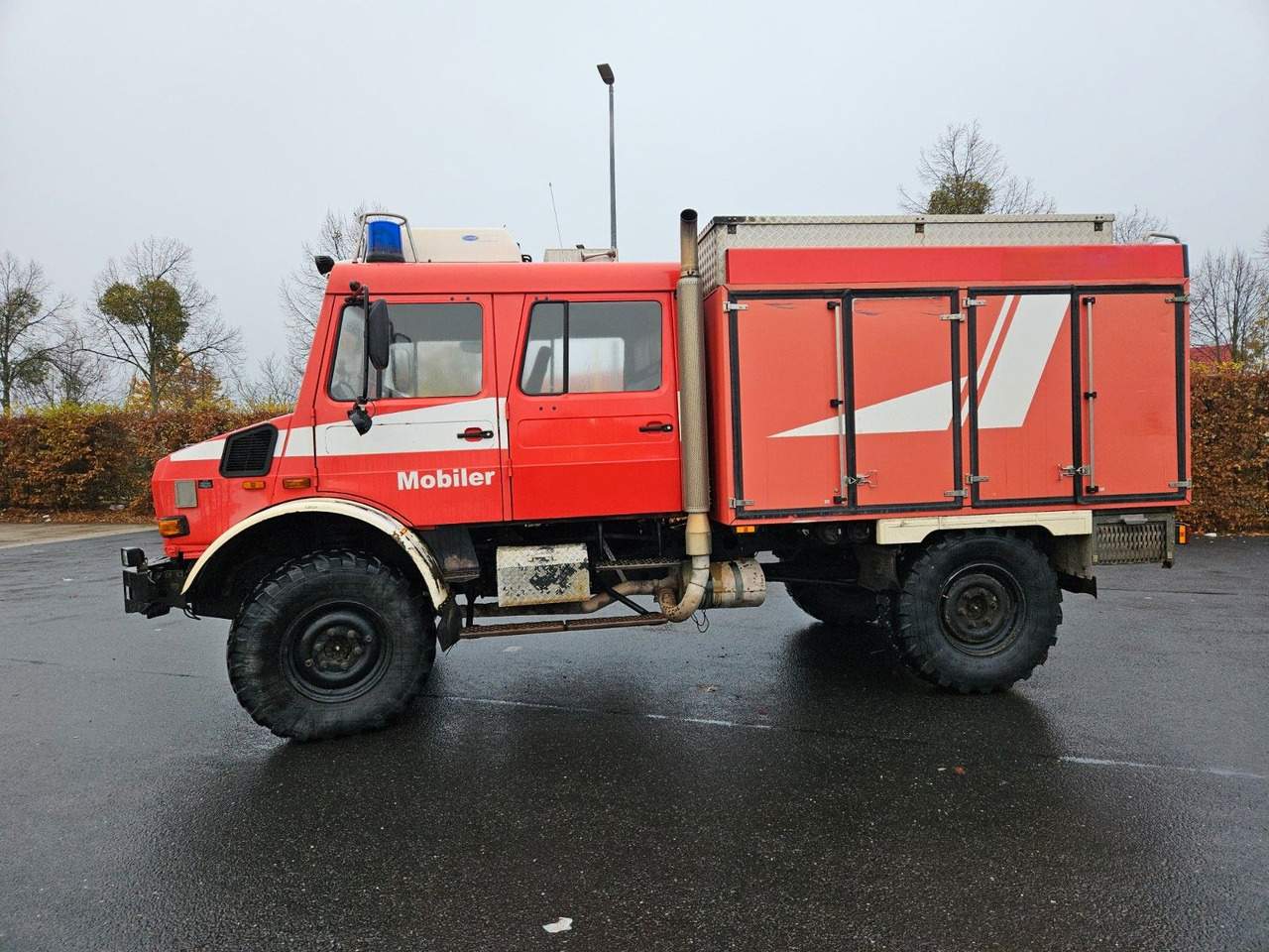 Unimog U4000 4x4 DOKA Tanklöschfahrzeug Feuerwehr - شاحنة صهريج: صورة 2 Unimog U4000 4x4 DOKA Tanklöschfahrzeug Feuerwehr - شاحنة صهريج: صورة 2