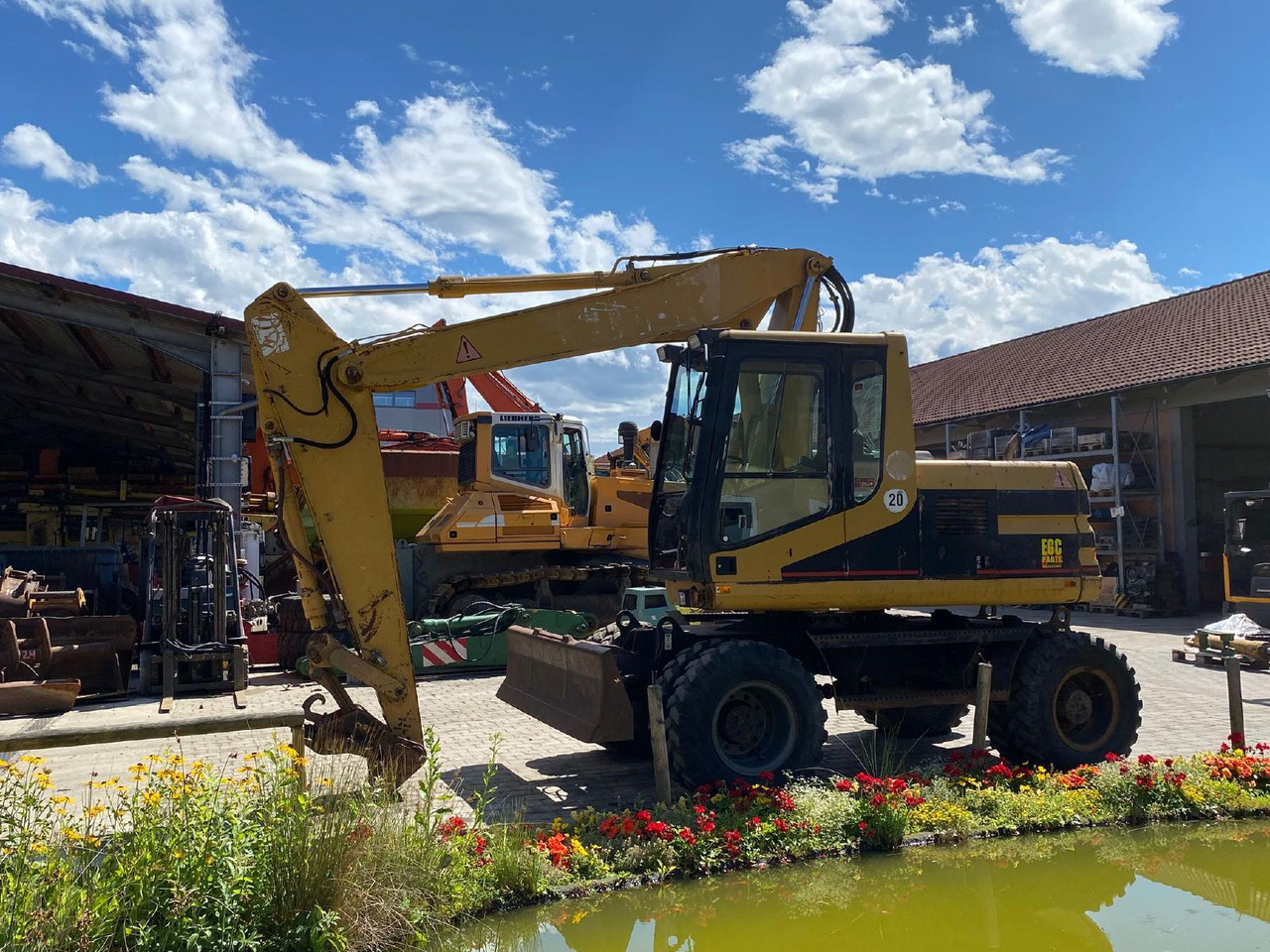 Caterpillar M 312 - حفار ذو عجلات: صورة 2 Caterpillar M 312 - حفار ذو عجلات: صورة 2