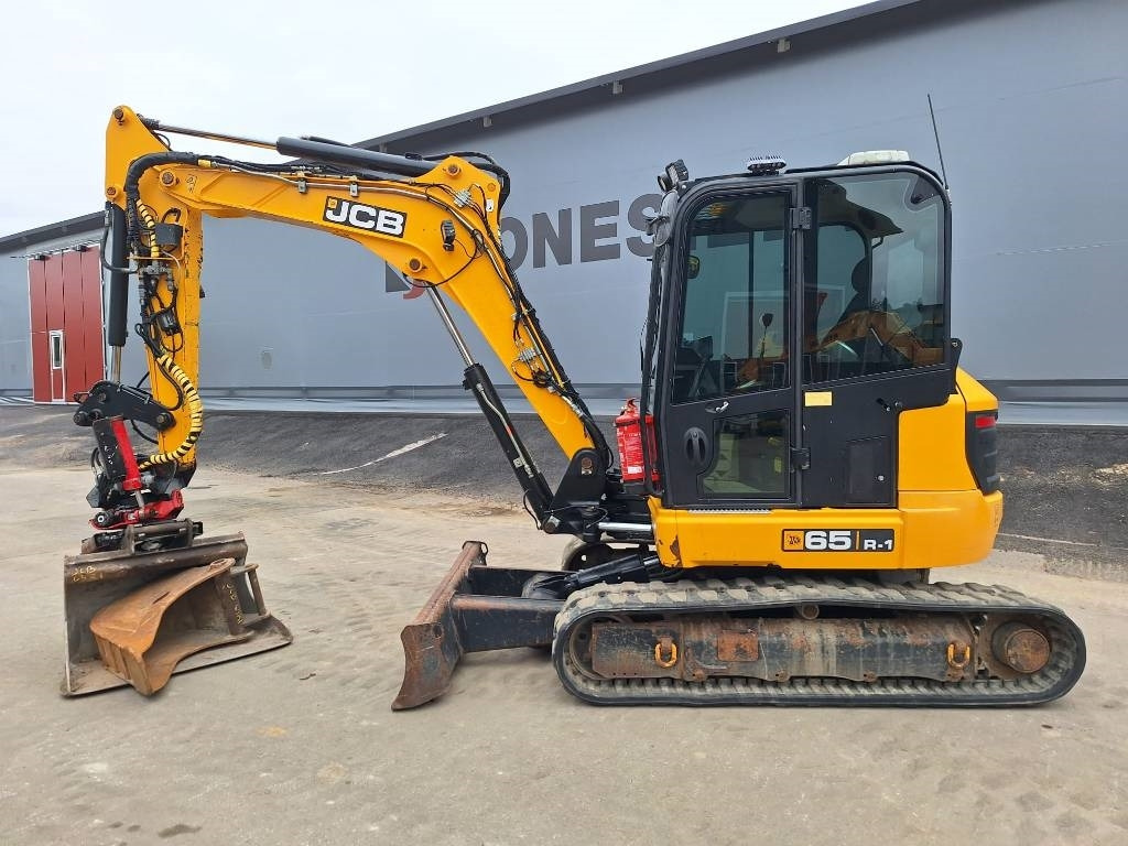 JCB 65R-1 PYÖRITTÄJÄLLÄ - حفار صغير: صورة 1 JCB 65R-1 PYÖRITTÄJÄLLÄ - حفار صغير: صورة 1