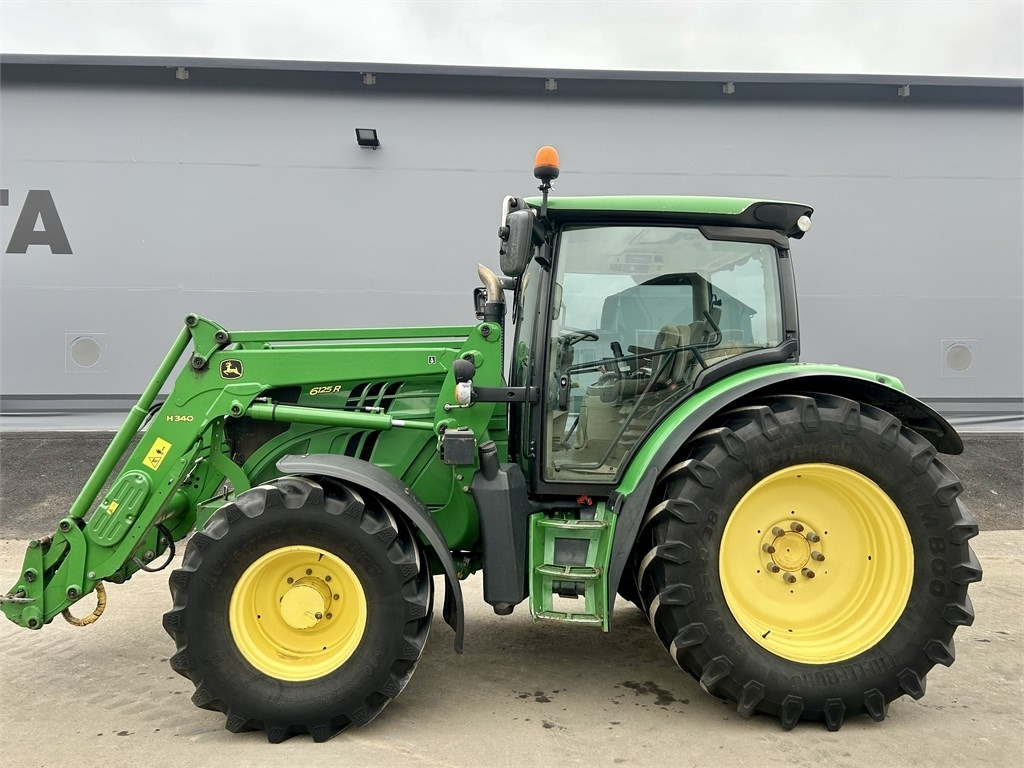 John Deere 6125 R AUTOPOWER ETUKUORMAAJALLA - جرار: صورة 1 John Deere 6125 R AUTOPOWER ETUKUORMAAJALLA - جرار: صورة 1