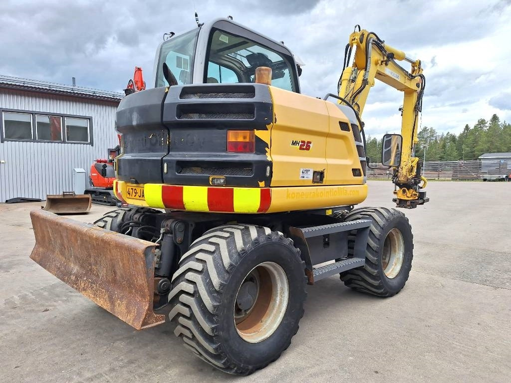 New Holland MYYTY! SOLD! MH2.6 ENGCON PIHDEILLÄ - حفار ذو عجلات: صورة 4 New Holland MYYTY! SOLD! MH2.6 ENGCON PIHDEILLÄ - حفار ذو عجلات: صورة 4