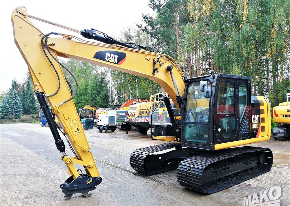 Caterpillar 312E - حفار زاحف: صورة 1 Caterpillar 312E - حفار زاحف: صورة 1