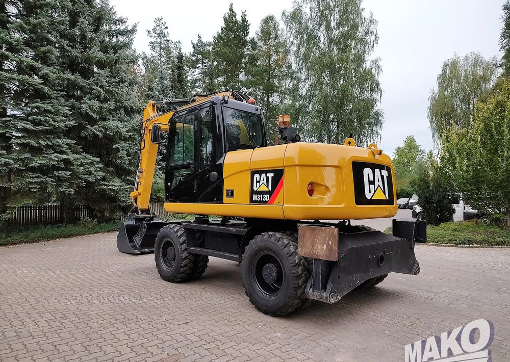 Caterpillar M313D - حفار ذو عجلات: صورة 2 Caterpillar M313D - حفار ذو عجلات: صورة 2