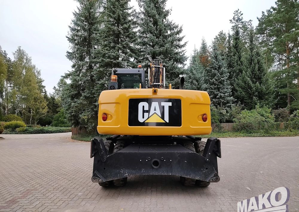 Caterpillar M313D - حفار ذو عجلات: صورة 3 Caterpillar M313D - حفار ذو عجلات: صورة 3