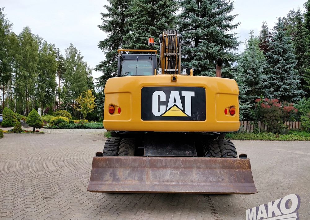 Caterpillar M313D - حفار ذو عجلات: صورة 3 Caterpillar M313D - حفار ذو عجلات: صورة 3
