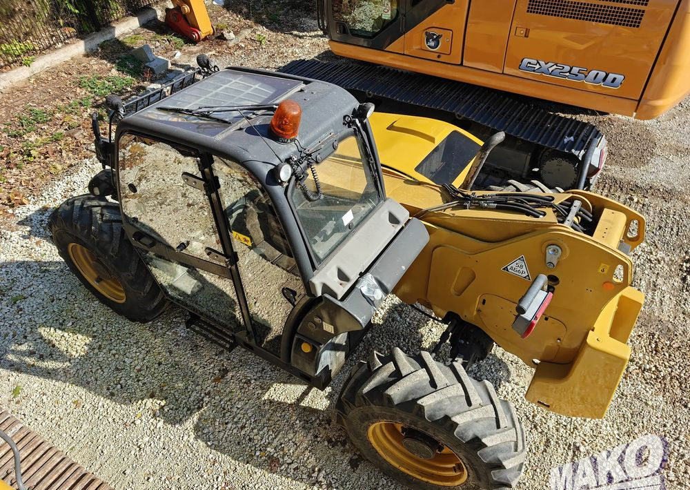 Caterpillar TH407 - آلات أخرى: صورة 2 Caterpillar TH407 - آلات أخرى: صورة 2