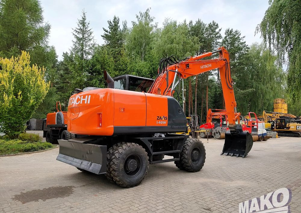 Hitachi ZX 140 - حفار ذو عجلات: صورة 4 Hitachi ZX 140 - حفار ذو عجلات: صورة 4