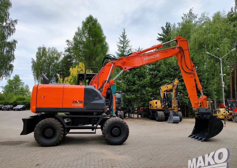 Hitachi ZX 140 - حفار ذو عجلات: صورة 5 Hitachi ZX 140 - حفار ذو عجلات: صورة 5