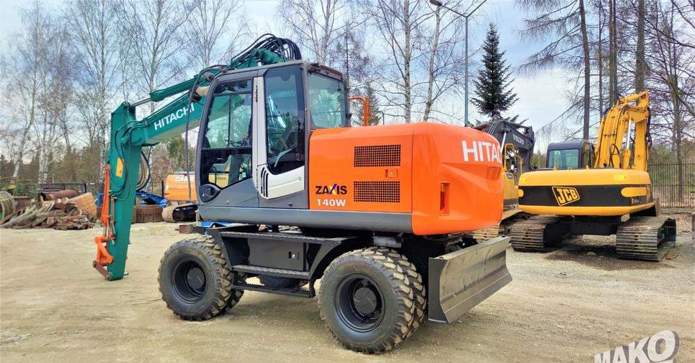 Hitachi ZX140W-3 - حفار ذو عجلات: صورة 2 Hitachi ZX140W-3 - حفار ذو عجلات: صورة 2