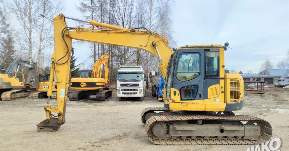 Komatsu PC138 US-8 - حفار زاحف: صورة 1 Komatsu PC138 US-8 - حفار زاحف: صورة 1