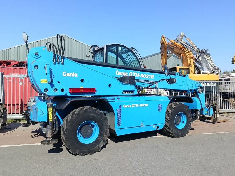 Genie GTH 5021 R roterende verreiker telescopic lade 21m - آلة رفع ونقل تلسكوبية: صورة 1 Genie GTH 5021 R roterende verreiker telescopic lade 21m - آلة رفع ونقل تلسكوبية: صورة 1
