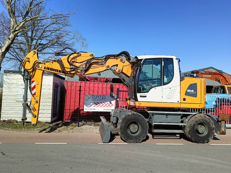 Liebherr A 914 compact mobiele graafmachine excavator 18Ton - حفار ذو عجلات: صورة 1 Liebherr A 914 compact mobiele graafmachine excavator 18Ton - حفار ذو عجلات: صورة 1