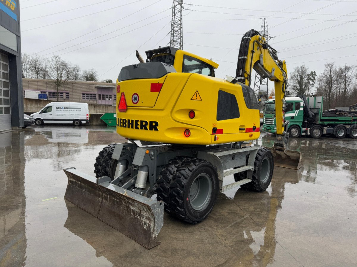LIEBHERR 910 Compact Litronic Powertilt - حفار ذو عجلات: صورة 4 LIEBHERR 910 Compact Litronic Powertilt - حفار ذو عجلات: صورة 4