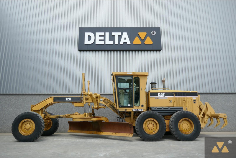 Caterpillar 12H - ماكينة تسوية: صورة 1 Caterpillar 12H - ماكينة تسوية: صورة 1