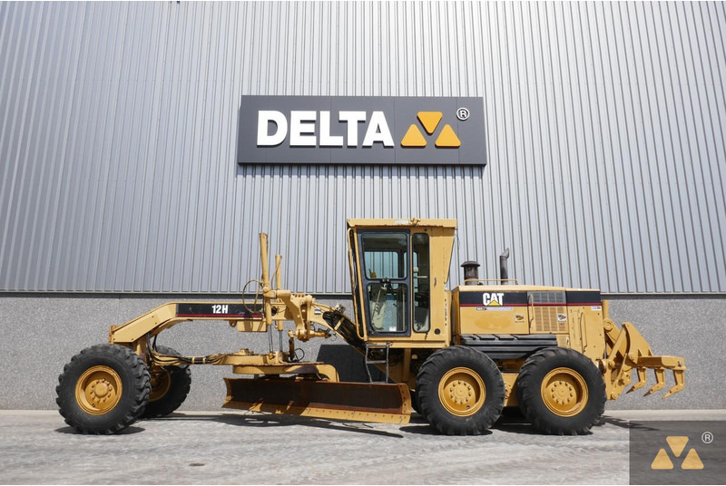 Caterpillar 12H - ماكينة تسوية: صورة 1 Caterpillar 12H - ماكينة تسوية: صورة 1
