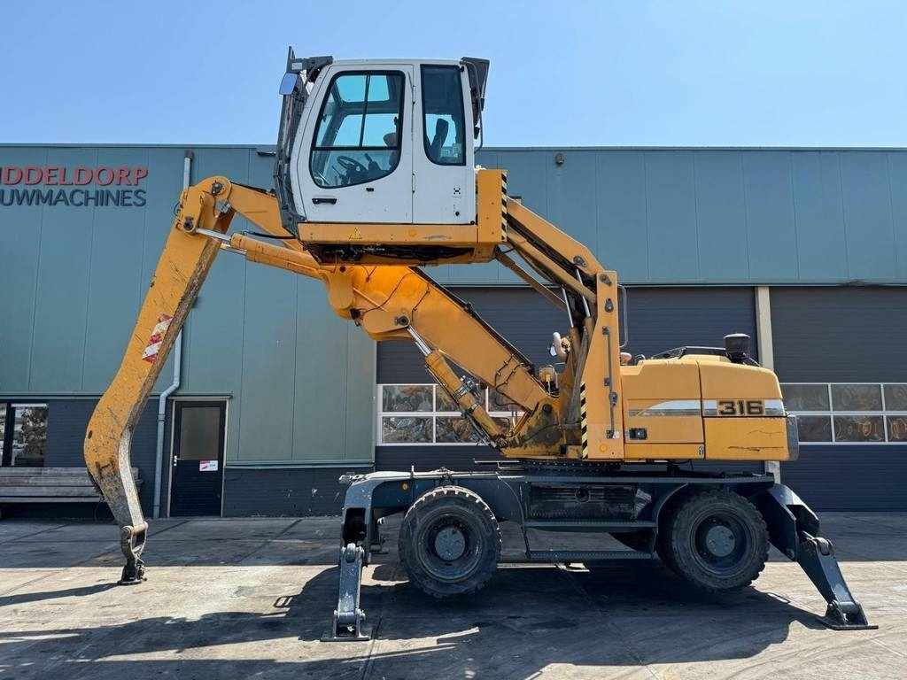 Liebherr A 316 - آلة التعامل مع النفايات: صورة 1 Liebherr A 316 - آلة التعامل مع النفايات: صورة 1