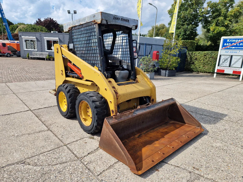 Caterpillar 216B3 schranklader met 1191 uur - شيول صغير: صورة 2 Caterpillar 216B3 schranklader met 1191 uur - شيول صغير: صورة 2