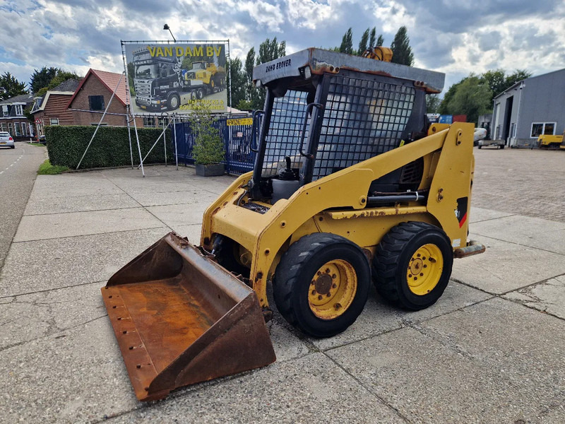 Caterpillar 216B3 schranklader met 1191 uur - شيول صغير: صورة 1 Caterpillar 216B3 schranklader met 1191 uur - شيول صغير: صورة 1