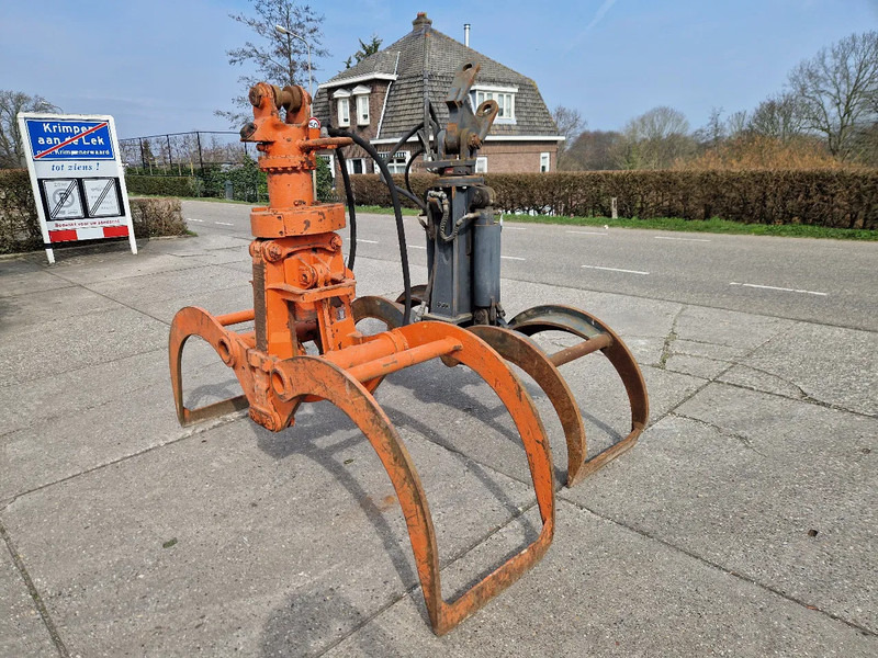 O & K en Atlas hydraulische bomenklemmen - كلّاب - معدات الغابات: صورة 1 O & K en Atlas hydraulische bomenklemmen - كلّاب - معدات الغابات: صورة 1
