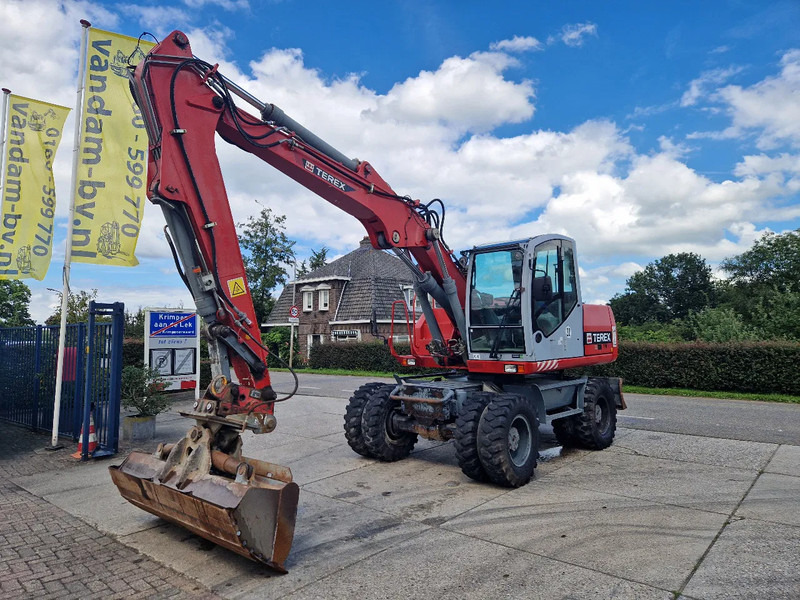 Terex TW160 inclusief kantelbak (1.98m.) - حفار ذو عجلات: صورة 1 Terex TW160 inclusief kantelbak (1.98m.) - حفار ذو عجلات: صورة 1
