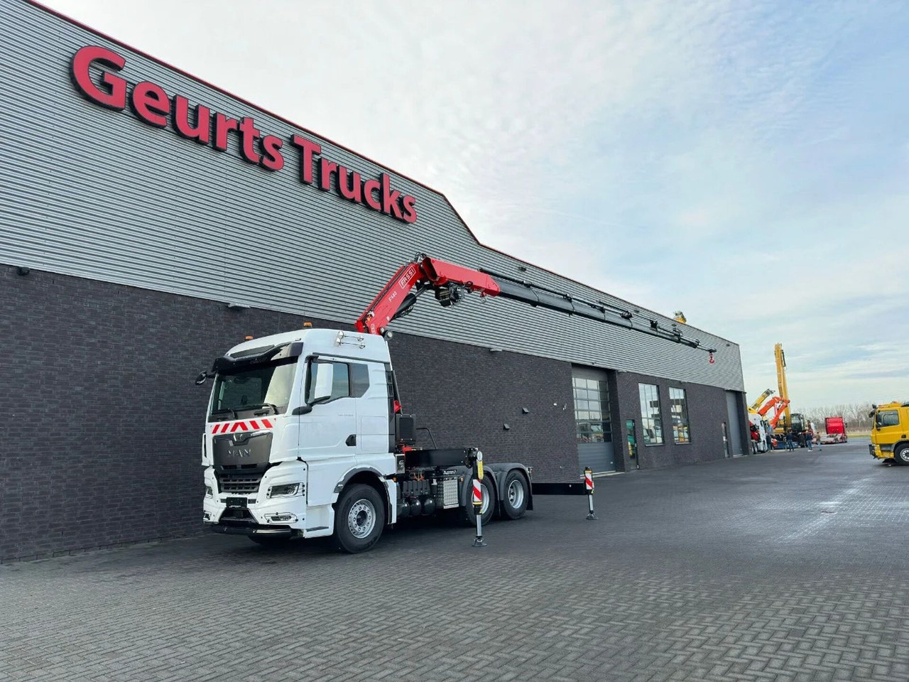 MAN TGX 33.520 6X4 TREKKER-BAKWAGEN COMBI + FASSI F4 - شاحنة كرين: صورة 2 MAN TGX 33.520 6X4 TREKKER-BAKWAGEN COMBI + FASSI F4 - شاحنة كرين: صورة 2