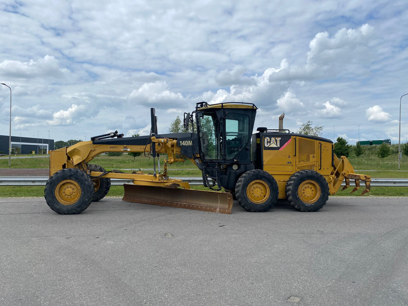 Caterpillar 140M - ماكينة تسوية: صورة 1 Caterpillar 140M - ماكينة تسوية: صورة 1