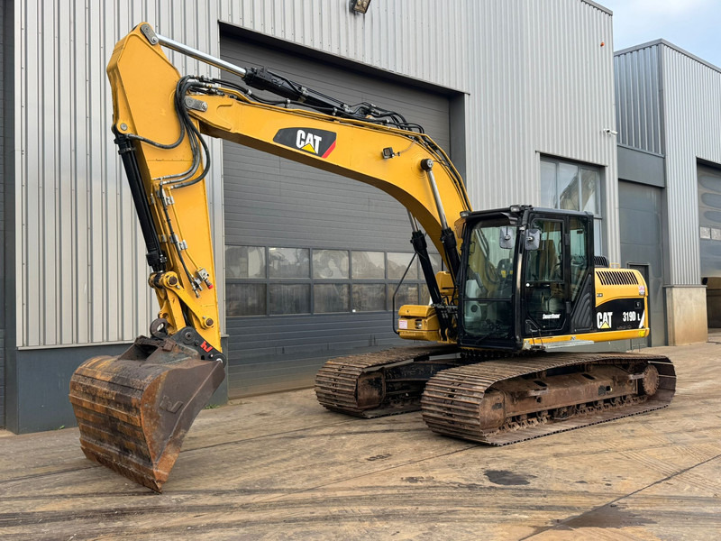 Caterpillar 319DL - حفار زاحف: صورة 2 Caterpillar 319DL - حفار زاحف: صورة 2