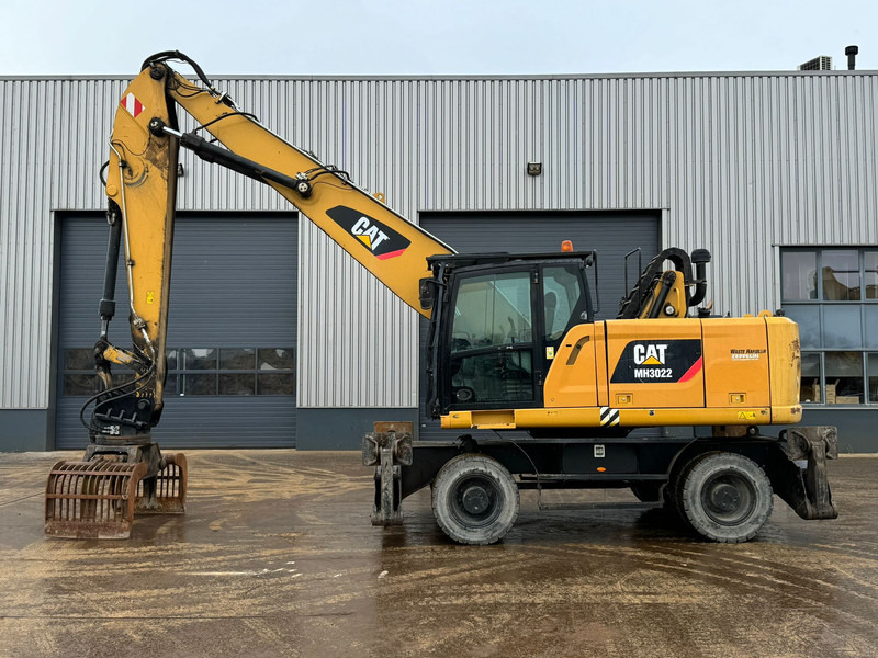 Caterpillar MH3022 - آلة التعامل مع النفايات: صورة 1 Caterpillar MH3022 - آلة التعامل مع النفايات: صورة 1