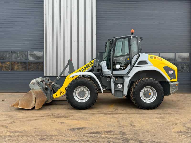 Kramer 8155 / Forks / bucket - اللودر بعجل: صورة 1 Kramer 8155 / Forks / bucket - اللودر بعجل: صورة 1