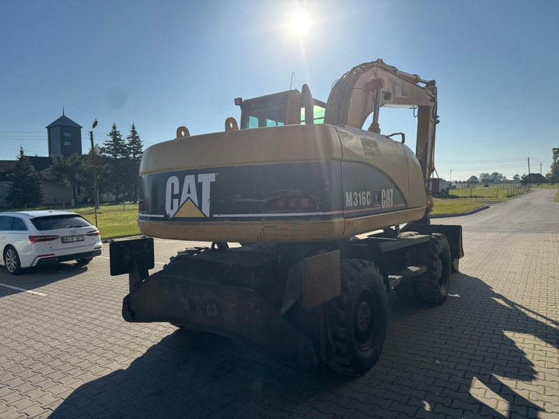 Caterpillar M 316 C - حفار ذو عجلات: صورة 3 Caterpillar M 316 C - حفار ذو عجلات: صورة 3