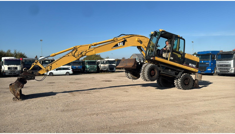 Caterpillar M 316 C - حفار ذو عجلات: صورة 5 Caterpillar M 316 C - حفار ذو عجلات: صورة 5
