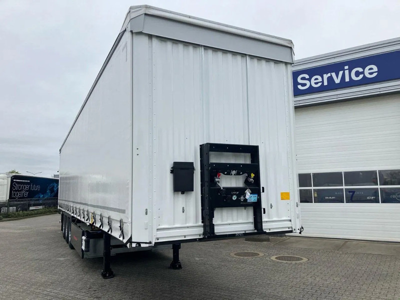 Kässbohrer SCS X+ / 90 - 12 / 27 Schuifzeilen multiplex vloer met palletkist 30 Europallets - نصف مقطورة بستائر جانبية: صورة 2 Kässbohrer SCS X+ / 90 - 12 / 27 Schuifzeilen multiplex vloer met palletkist 30 Europallets - نصف مقطورة بستائر جانبية: صورة 2