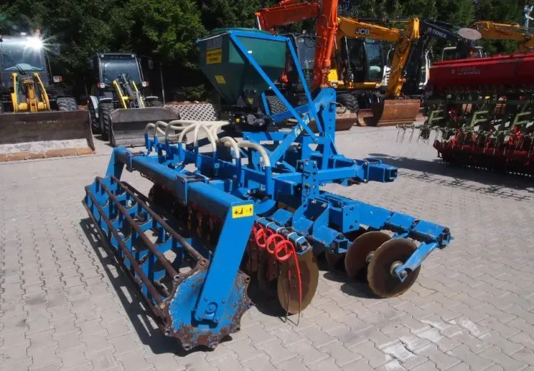 Agregat uprawowo-siewny Rabe Werk 2011 3m brona talerzowa z siewnikiem do poplonów - آلة بذر الحصاد: صورة 5 Agregat uprawowo-siewny Rabe Werk 2011 3m brona talerzowa z siewnikiem do poplonów - آلة بذر الحصاد: صورة 5