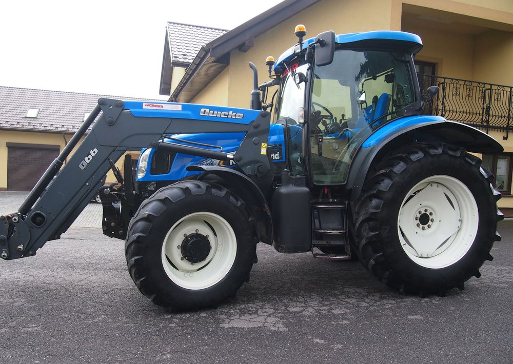 Ciągnik New Holland NH TS125A 6 cylindrów 2004 Ciągnik rolniczy New Holland TS125A - جرار: صورة 3 Ciągnik New Holland NH TS125A 6 cylindrów 2004 Ciągnik rolniczy New Holland TS125A - جرار: صورة 3