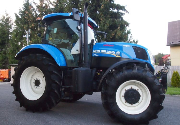 Ciągnik New Holland T7.185 2013 New Holland Autocommand i TUZ - جرار: صورة 4 Ciągnik New Holland T7.185 2013 New Holland Autocommand i TUZ - جرار: صورة 4