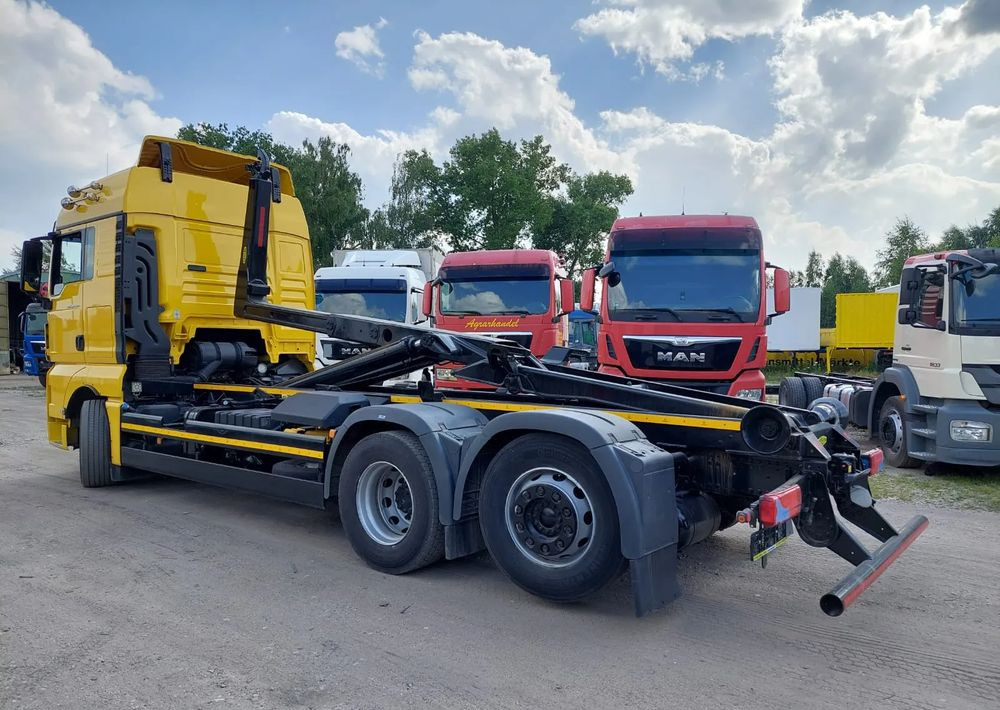 MAN TGX 26-500 Hakowiec oś skrętna - شاحنة برافعة خطافية: صورة 1 MAN TGX 26-500 Hakowiec oś skrętna - شاحنة برافعة خطافية: صورة 1