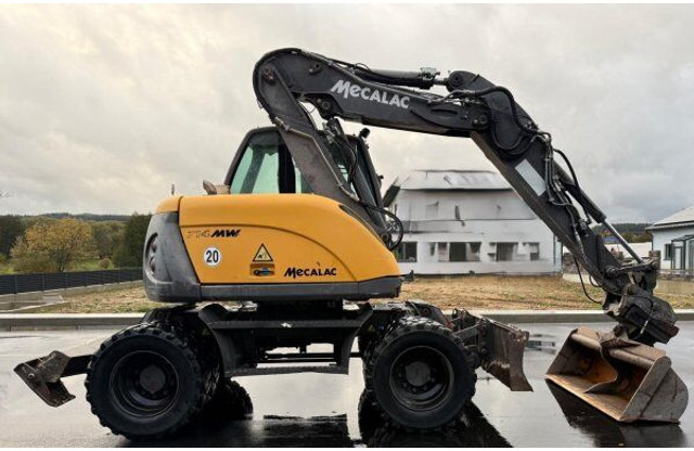 Mecalac 714 MW - حفار ذو عجلات: صورة 4 Mecalac 714 MW - حفار ذو عجلات: صورة 4