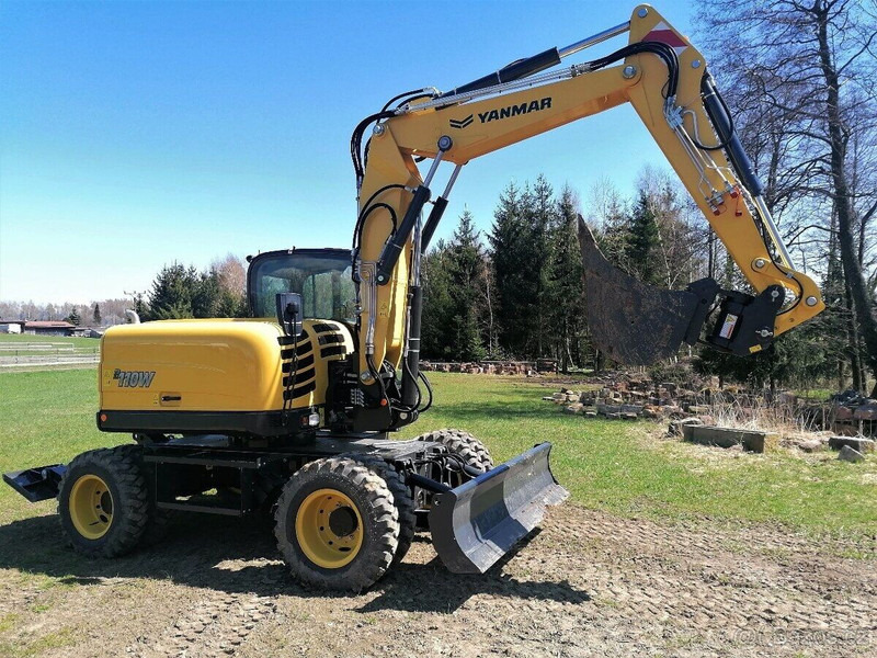Yanmar B110 W - حفار ذو عجلات: صورة 1 Yanmar B110 W - حفار ذو عجلات: صورة 1
