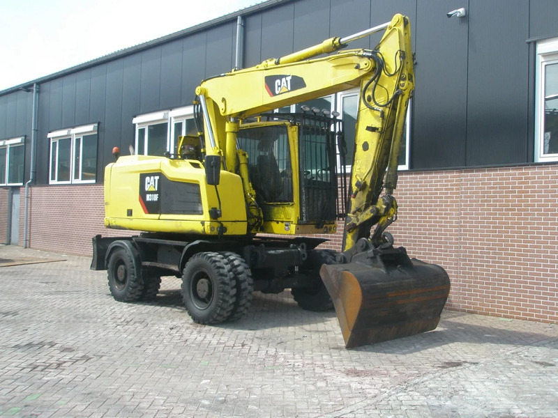 Caterpillar M318F - حفار ذو عجلات: صورة 4 Caterpillar M318F - حفار ذو عجلات: صورة 4