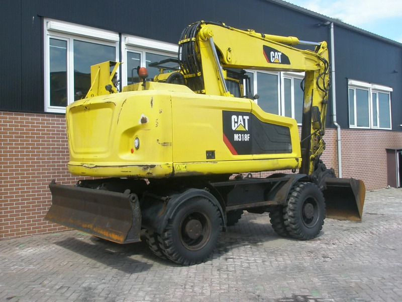 Caterpillar M318F - حفار ذو عجلات: صورة 3 Caterpillar M318F - حفار ذو عجلات: صورة 3