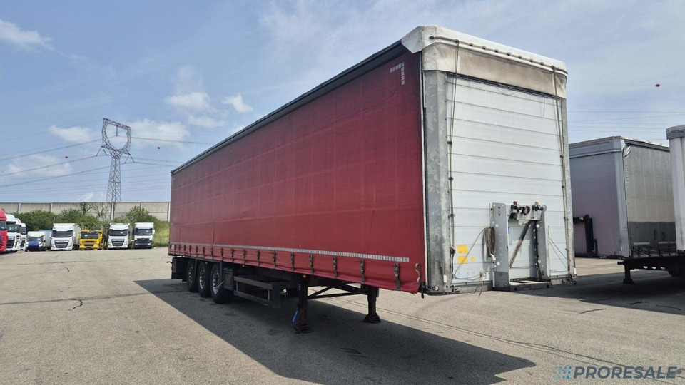 SCHMITZ CARGOBULL SCS 24/L - 13.62 EB - نصف مقطورة بستائر جانبية: صورة 1 SCHMITZ CARGOBULL SCS 24/L - 13.62 EB - نصف مقطورة بستائر جانبية: صورة 1