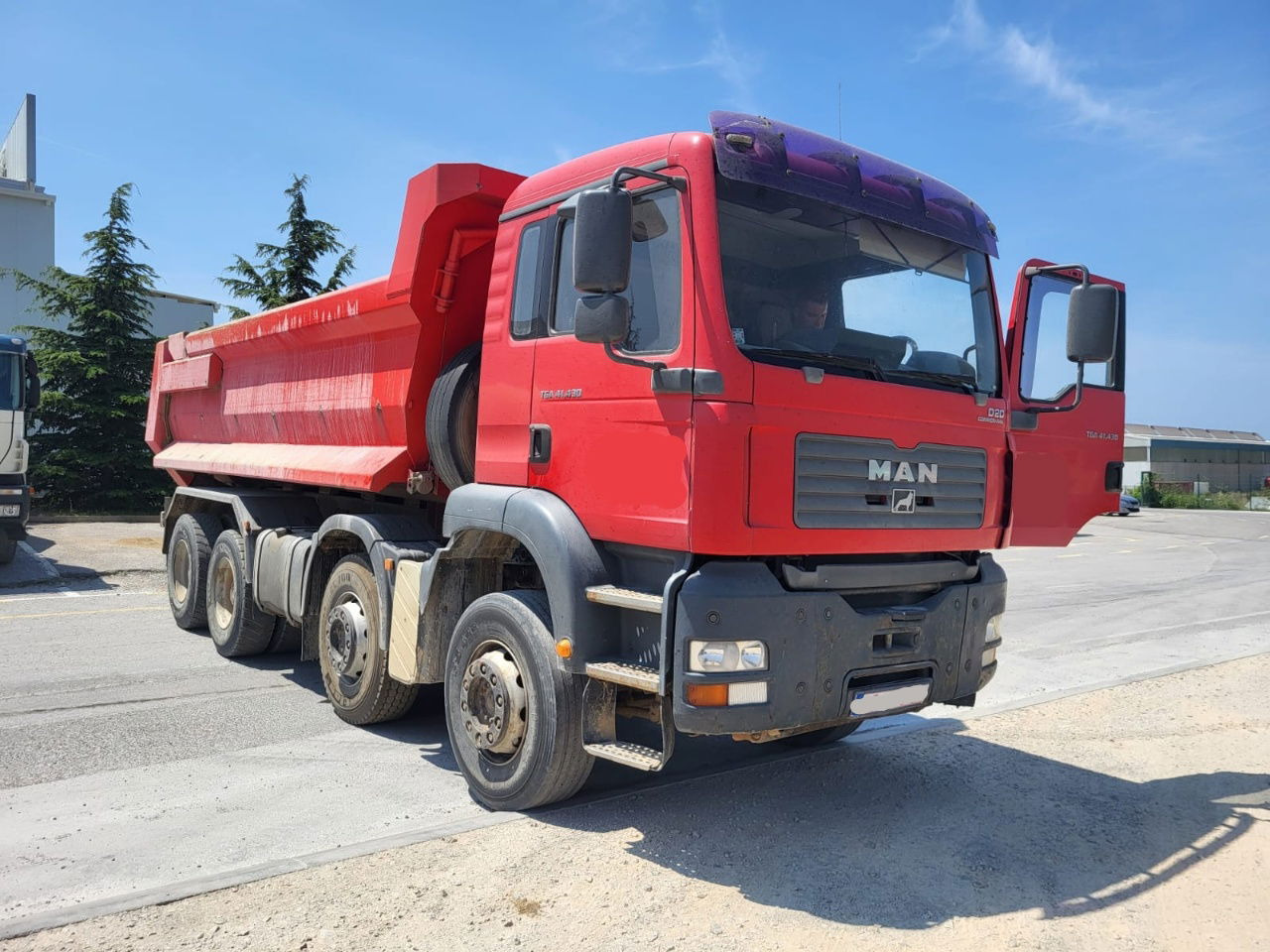 MAN TGA 41.430 8x4 meiller tipper - hydr. back site - شاحنة قلاب: صورة 2 MAN TGA 41.430 8x4 meiller tipper - hydr. back site - شاحنة قلاب: صورة 2