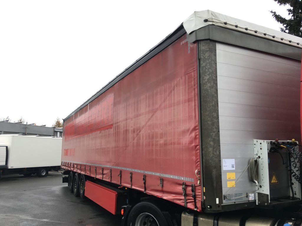 Schmitz Cargobull SCB*S3T standard/lifting roof/Hubdach 2,70-2,85m - نصف مقطورة بستائر جانبية: صورة 1 Schmitz Cargobull SCB*S3T standard/lifting roof/Hubdach 2,70-2,85m - نصف مقطورة بستائر جانبية: صورة 1