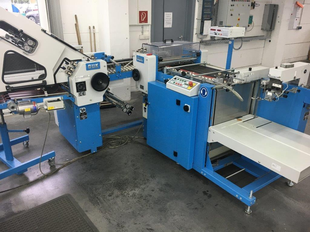 GUK SM 50-2 cutting machine with feeder - آلة تجليد: صورة 1 GUK SM 50-2 cutting machine with feeder - آلة تجليد: صورة 1